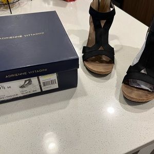 Woman’s sandals. Black. 2 1/2” heels.